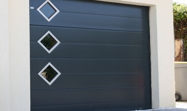 Portes de garage &agrave;&nbsp;ORADOUR SUR GLANE